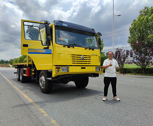 One Unit of HOWO 6X6 Flatbed Truck with XCMG Crane Ship to Tanzania