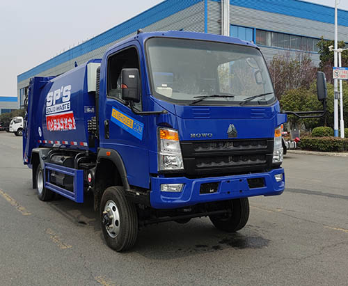 One Unit of HOWO AWD 5CBM Compressed Garbage Truck Ship to Greneda