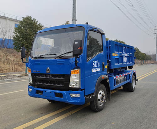 One Unit of HOWO RHD 3CBM Hook Arm Garbage Truck Ship to Greneda