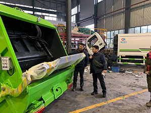 Customer from South Korea come to factory and study compactor waste equipment