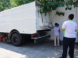 Customer from Malaysia come to factory and study our sweeper truck