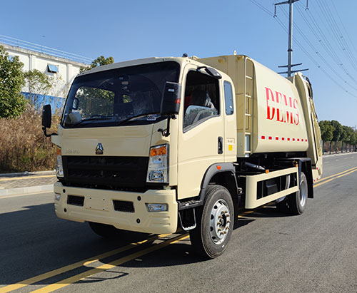 One Unit of HOWO RHD 10ton Waste Compactor Truck Ship to Greneda